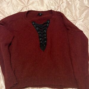 Express sweater. Large. Cute lace up,  more of a maroon color